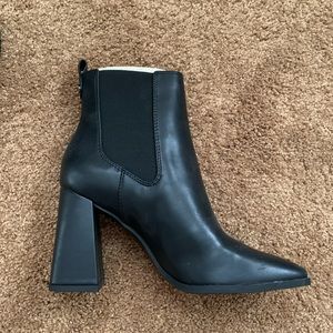 Square toed black heeled boots